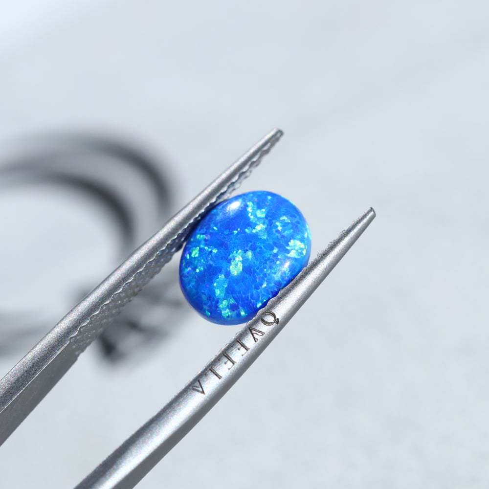 1.5 Carat Oval Cut Lab Grown Blue Opal Loose Stone