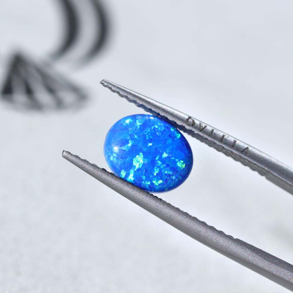 1.5 Carat Oval Cut Lab Grown Blue Opal Loose Stone