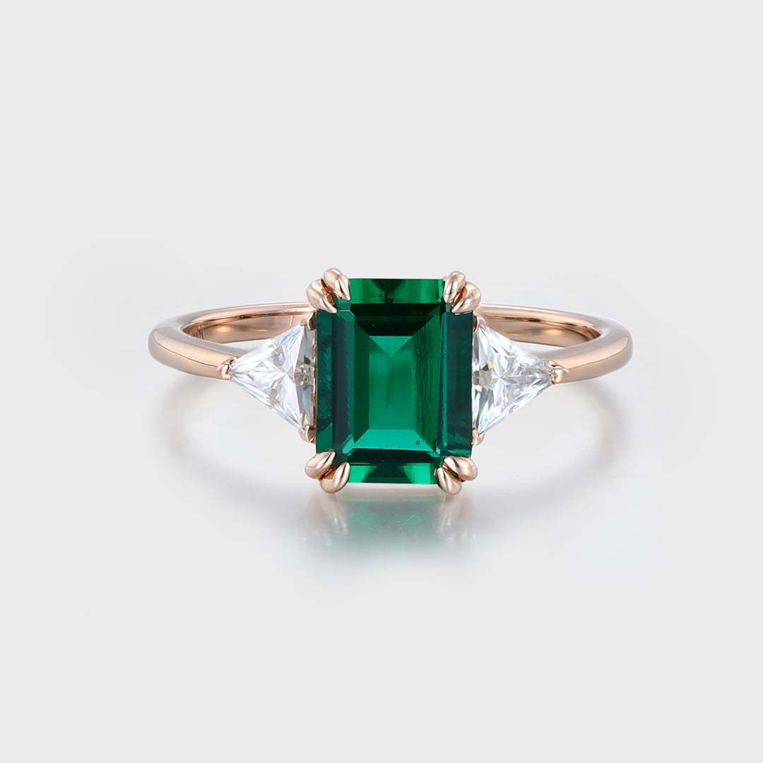 1.5ct Emerald Cut Emerald Three Stone Engagement Ring In 14k Rose Gold.