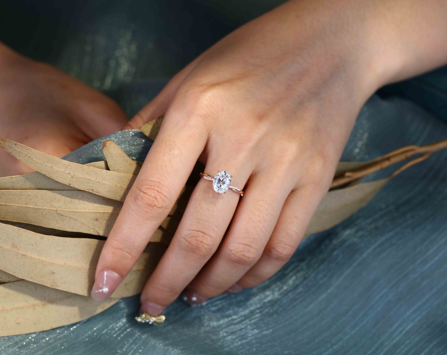 2 Carat Oval Moissanite Twist Engagement Ring In 14k Rose Gold