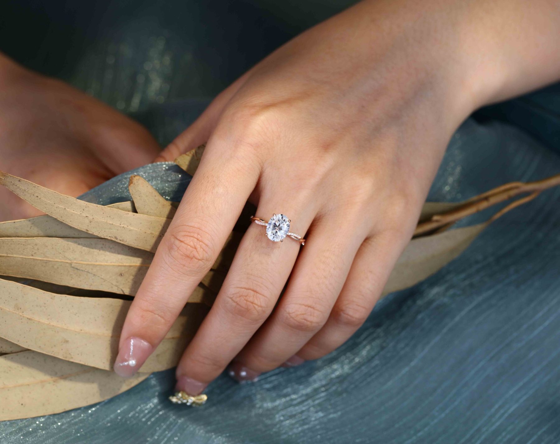 2 Carat Oval Moissanite Twist Engagement Ring In 14k Rose Gold