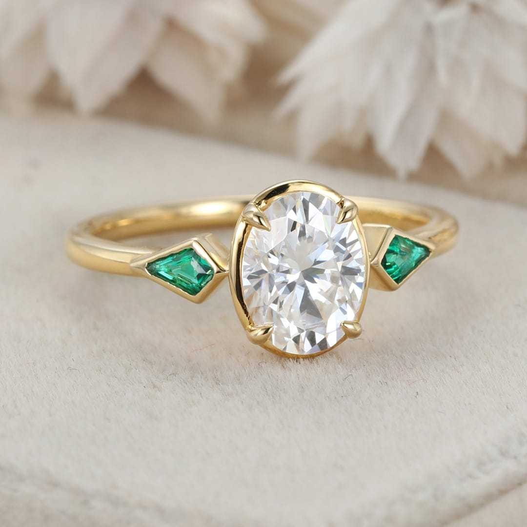 Bezel Set Oval Cut Moissanite Engagement Ring Unique 14K Yellow Gold Lab Emerald Side Stone Ring Delicate Wedding Ring