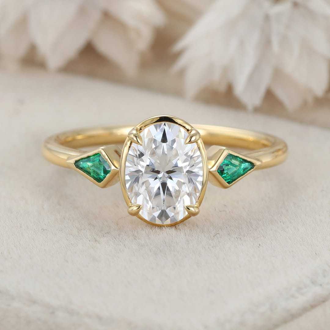 Bezel Set Oval Cut Moissanite Engagement Ring Unique 14K Yellow Gold Lab Emerald Side Stone Ring Delicate Wedding Ring