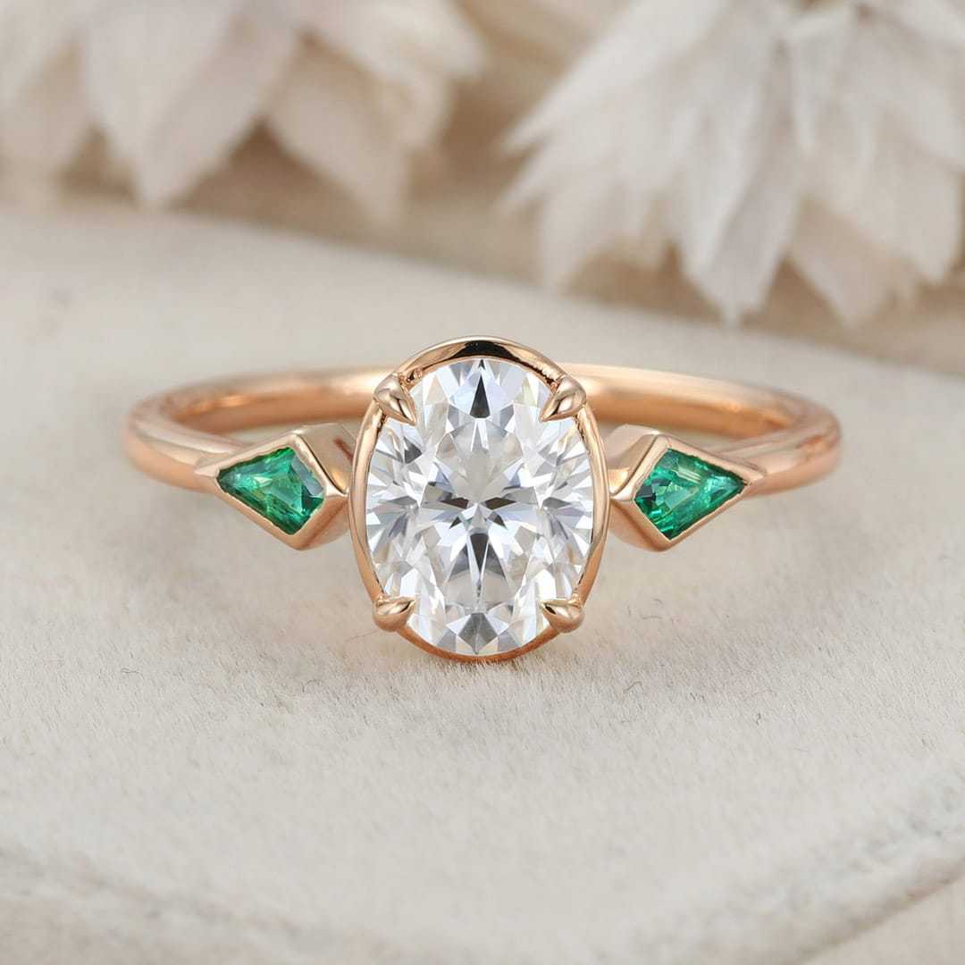 Bezel Set Oval Cut Moissanite Engagement Ring Unique 14K Yellow Gold Lab Emerald Side Stone Ring Delicate Wedding Ring