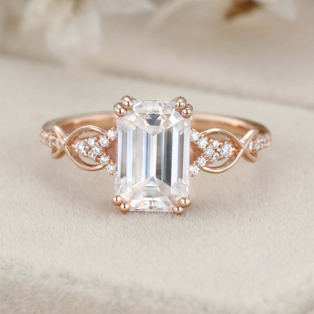 2 Carat Emerald Cut Moissanite Twist Engagement Ring In 14k Rose Gold