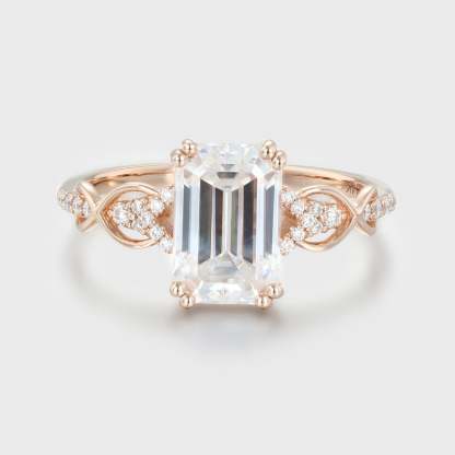 2 Carat Emerald Cut Moissanite Twist Engagement Ring In 14k Rose Gold