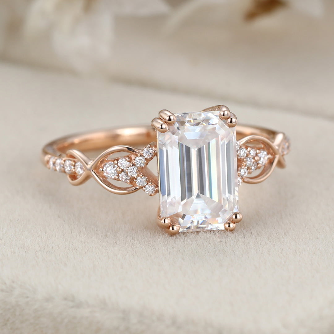 2 Carat Emerald Cut Moissanite Twist Engagement Ring In 14k Rose Gold