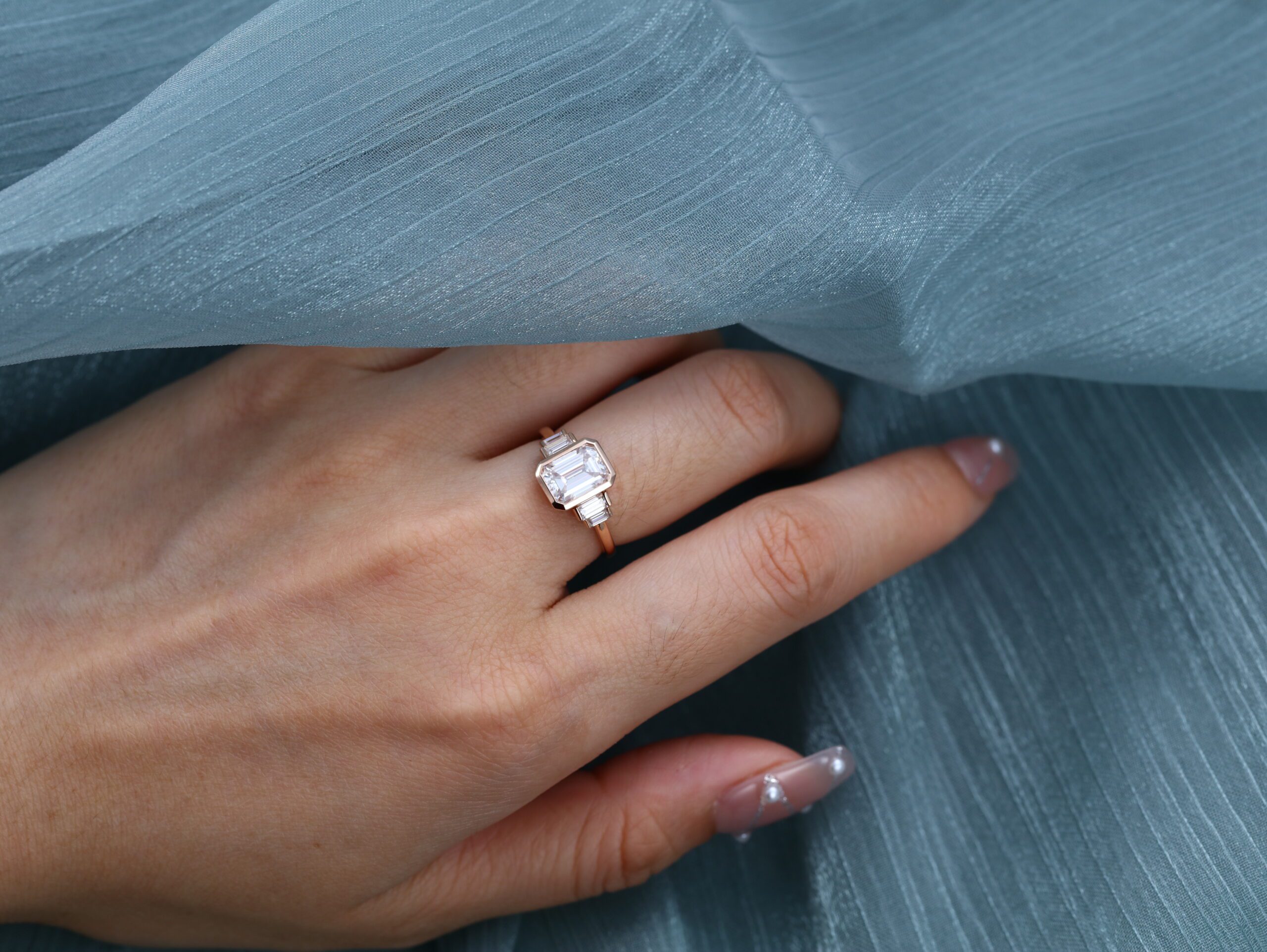 Bezel Set Art Deco Carat Emerald Cut Moissanite Ring In 14K Rose