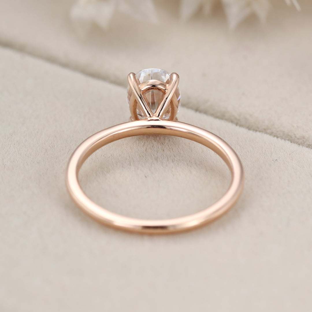 Simple 8x6mm 1.5 Carat Oval Moissanite Ring In 14K Rose Gold