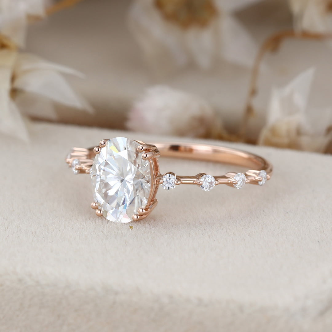 1.5 Carat Oval Moissanite Side Stones Engagement Ring In 14k Rose Gold