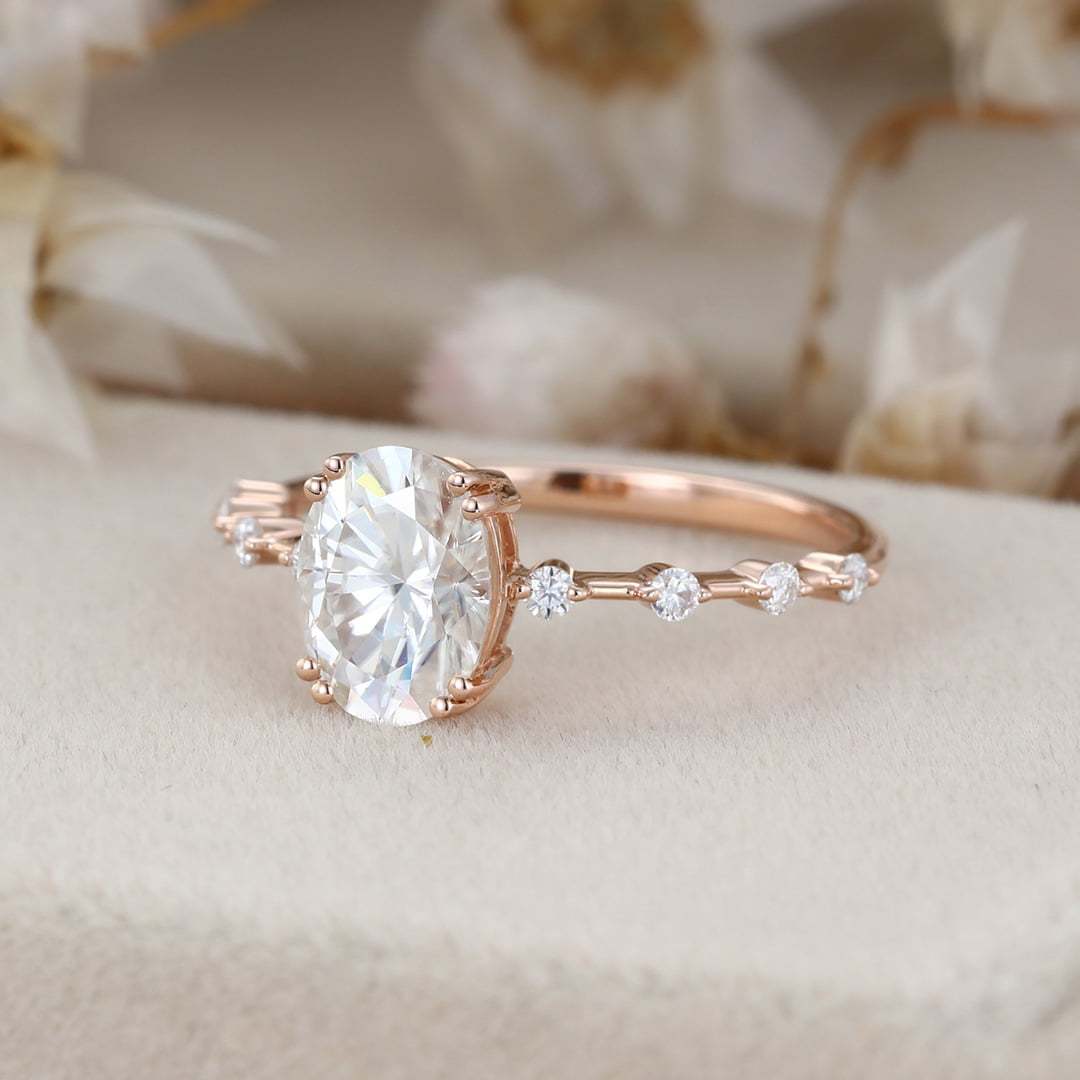 1.5 Carat Oval Moissanite Side Stones Engagement Ring In 14k Rose Gold