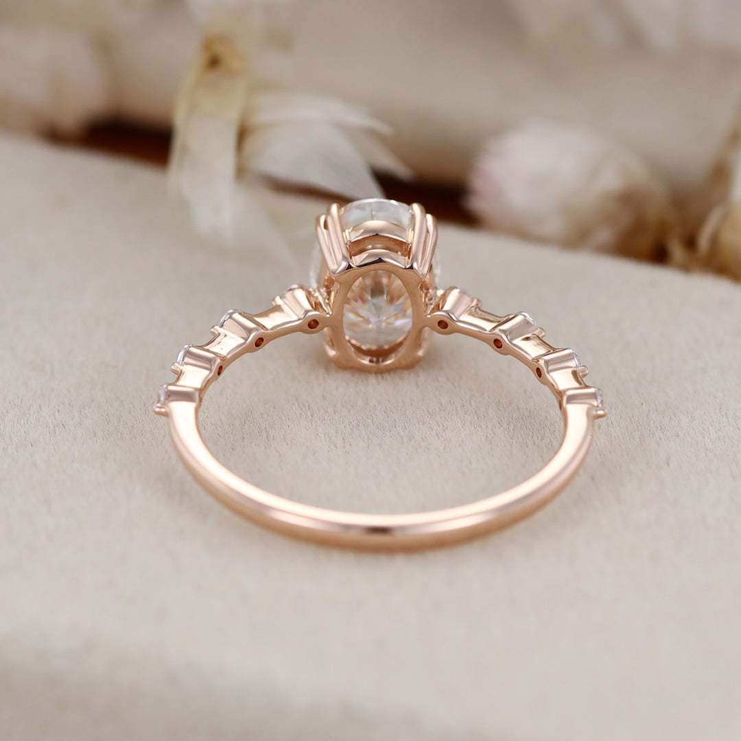 1.5 Carat Oval Moissanite Side Stones Engagement Ring In 14k Rose Gold