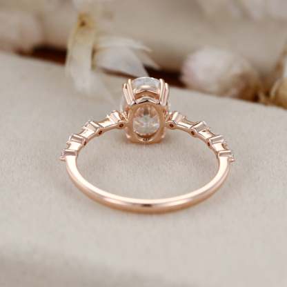 1.5 Carat Oval Moissanite Side Stones Engagement Ring In 14k Rose Gold