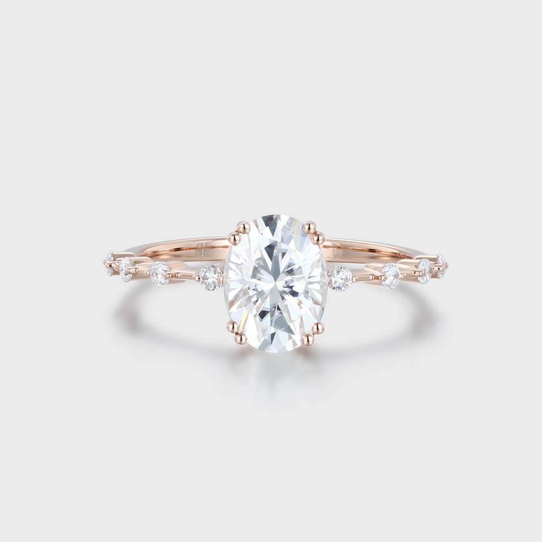 1.5 Carat Oval Moissanite Side Stones Engagement Ring In 14k Rose Gold