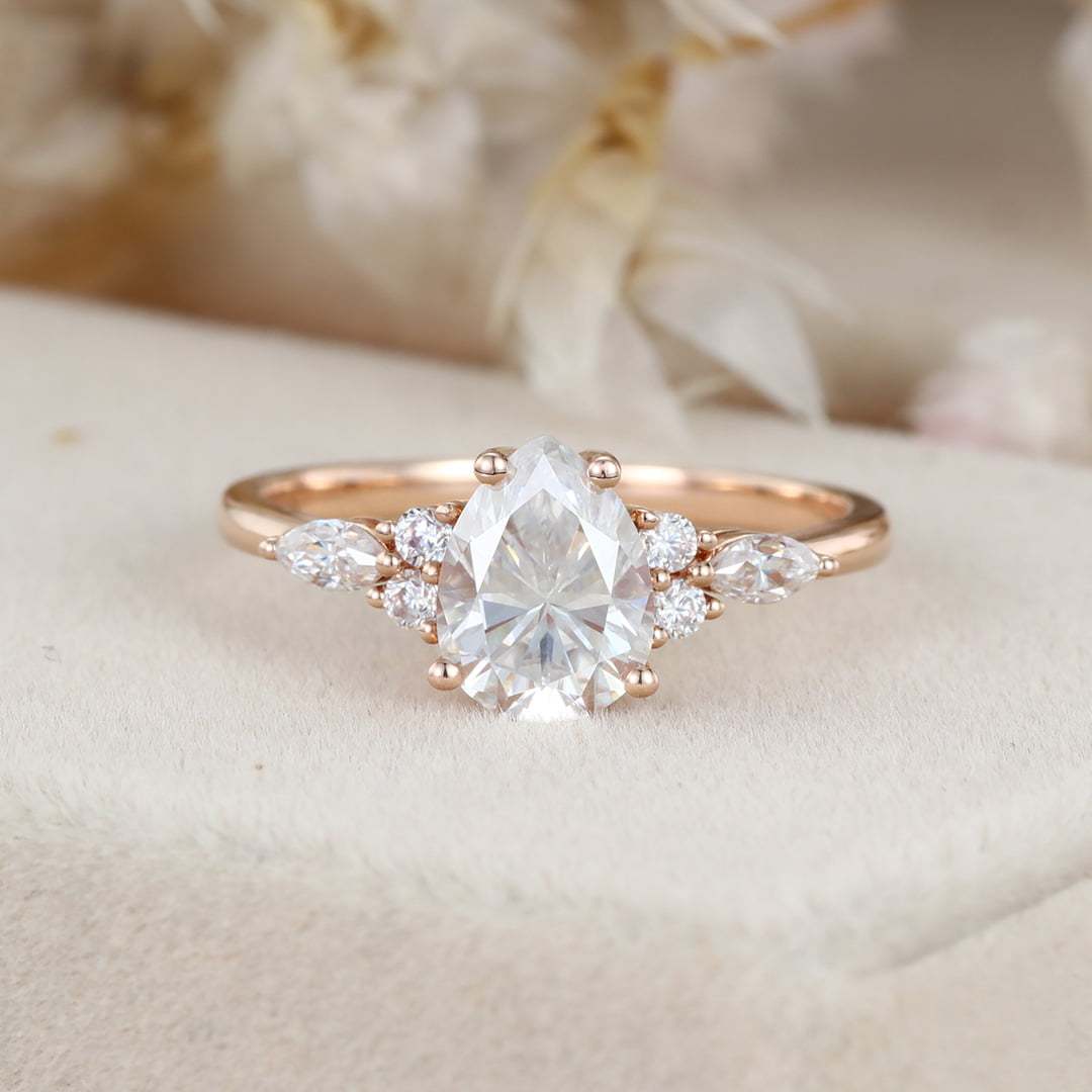 1.5 Carat Pear Shaped Moissanite Engagement Ring In 14K Rose Gold