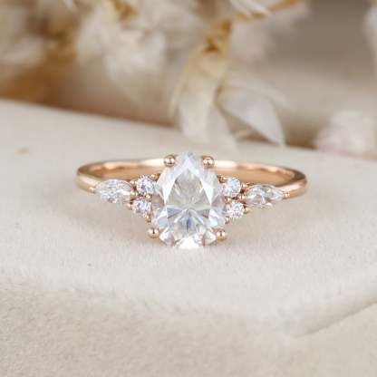 1.5 Carat Pear Shaped Moissanite Engagement Ring In 14K Rose Gold
