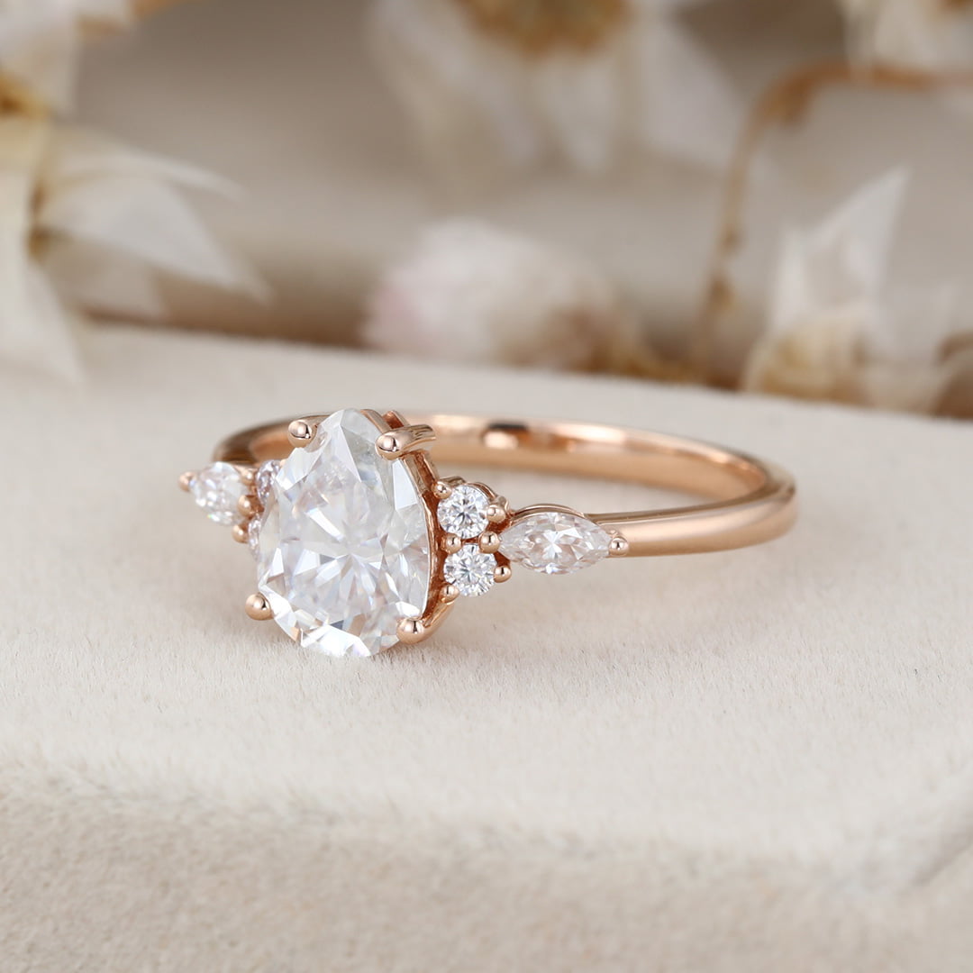 1.5 Carat Pear Shaped Moissanite Engagement Ring In 14K Rose Gold