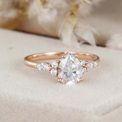 1.5 Carat Pear Shaped Moissanite Engagement Ring In 14K Rose Gold