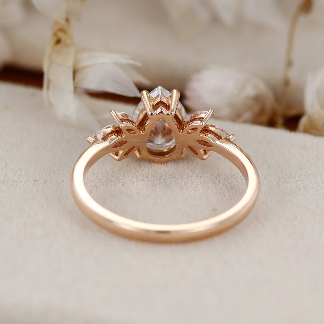 1.5 Carat Pear Cut Moissanite Ring In 14k Rose Gold Side Stone Vintage Ring