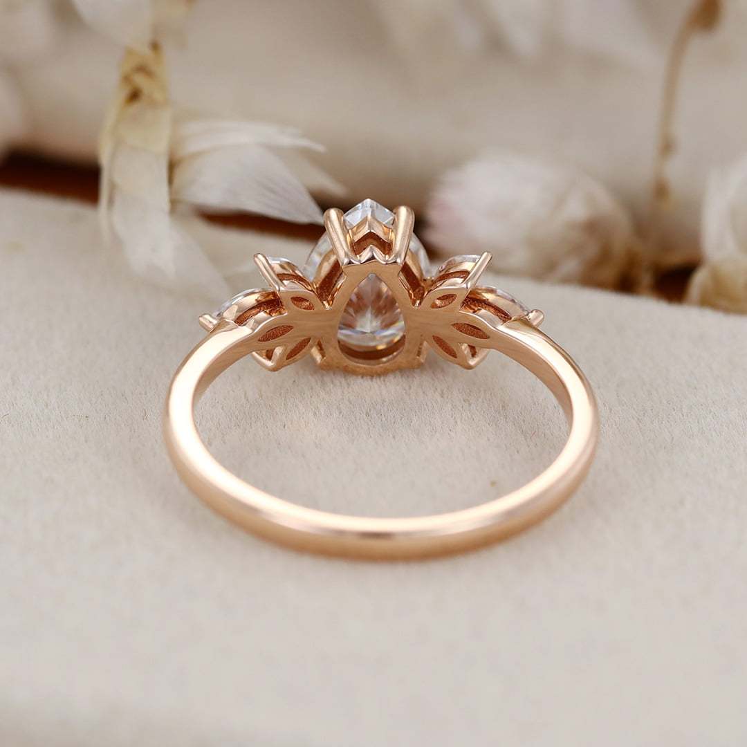 1.5 Carat Pear Cut Moissanite Ring In 14k Rose Gold Side Stone Vintage Ring