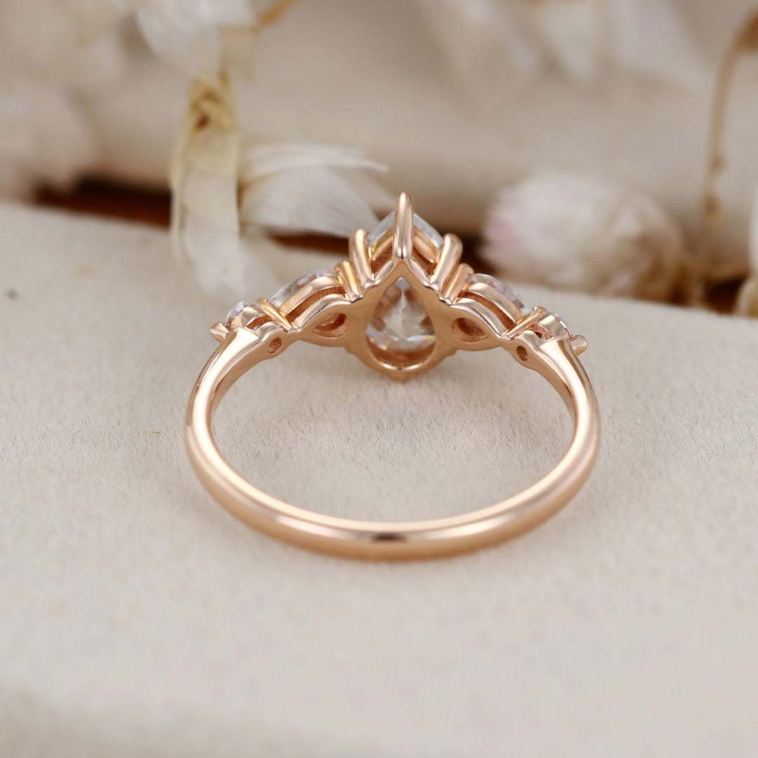 1.5 Carat Pear Shaped Moissanite Ring In 14k Rose Gold