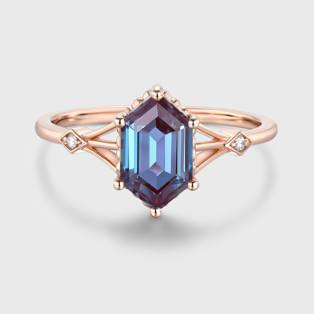 Unique Long Hexagon Cut Three-Stone Alexandrite Engagement Ring in Rose Gold