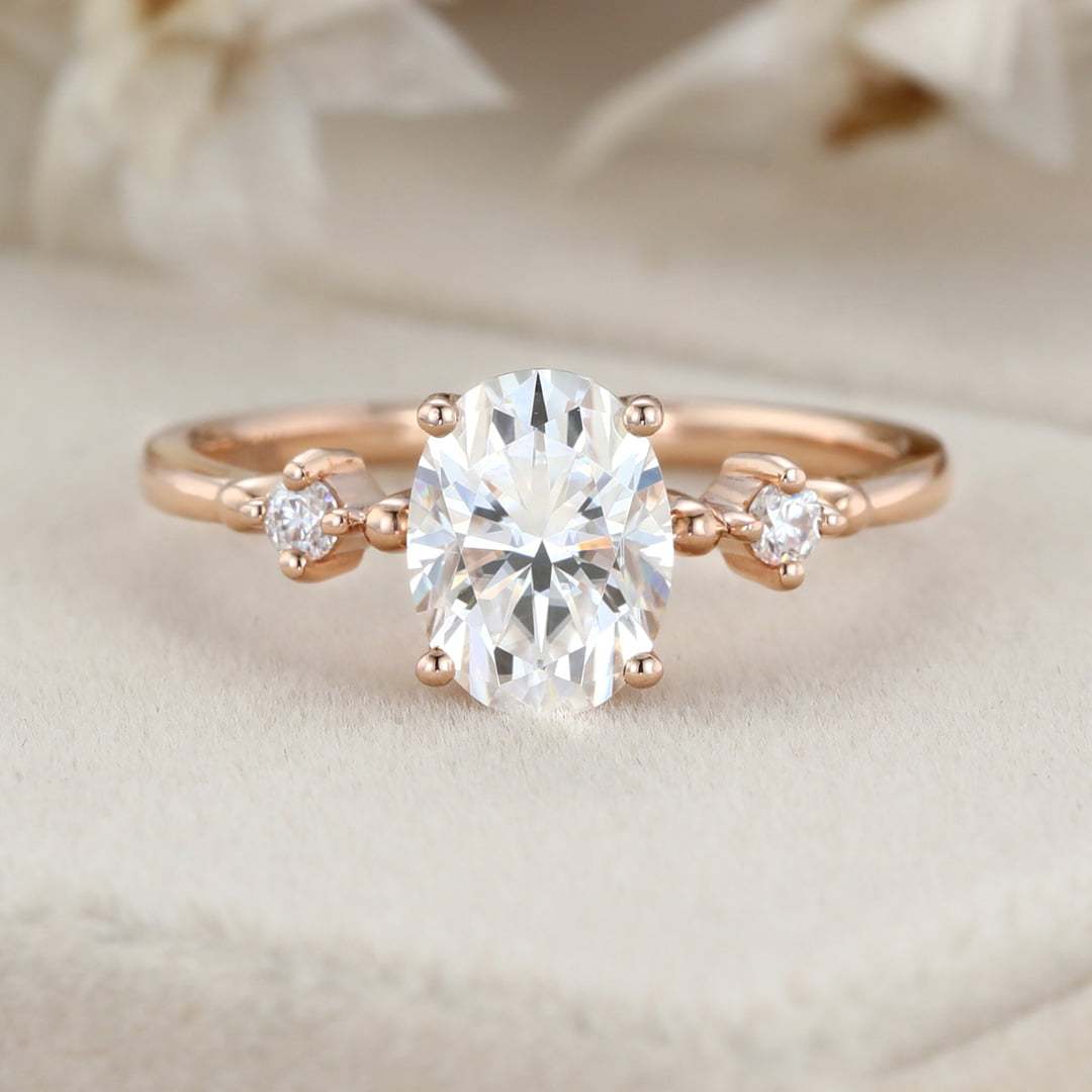 1.5 Carat Oval Moissanite Three Stone Engagement Ring In 10K Rose Gold