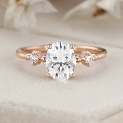 1.5 Carat Oval Moissanite Three Stone Engagement Ring In 10K Rose Gold