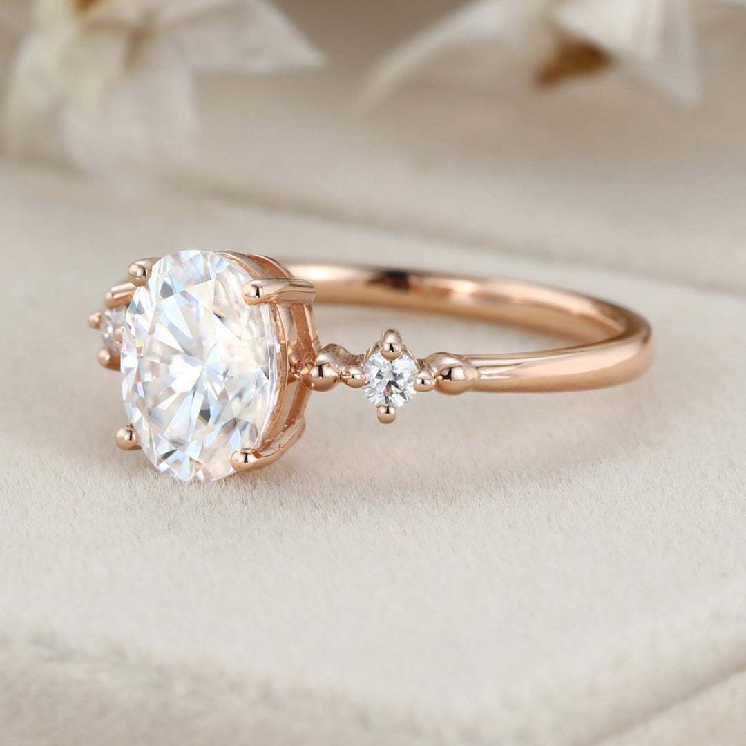 1.5 Carat Oval Moissanite Three Stone Engagement Ring In 10K Rose Gold