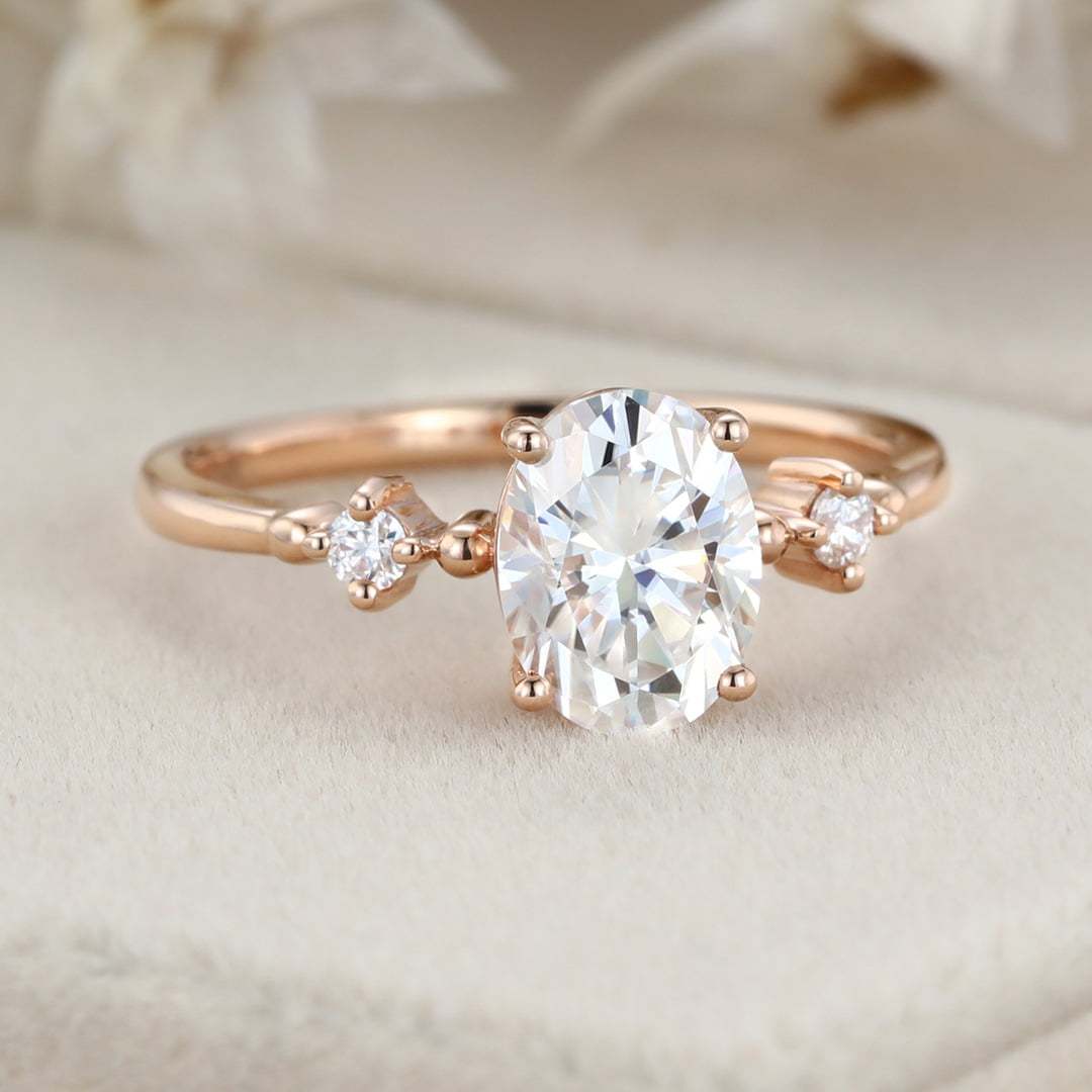 1.5 Carat Oval Moissanite Three Stone Engagement Ring In 10K Rose Gold
