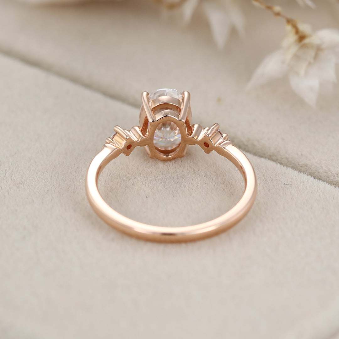 1.5 Carat Oval Moissanite Three Stone Engagement Ring In 10K Rose Gold