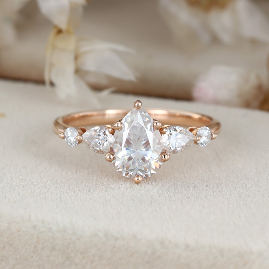 1.5 Carat Pear Shaped Moissanite Ring In 14k Rose Gold