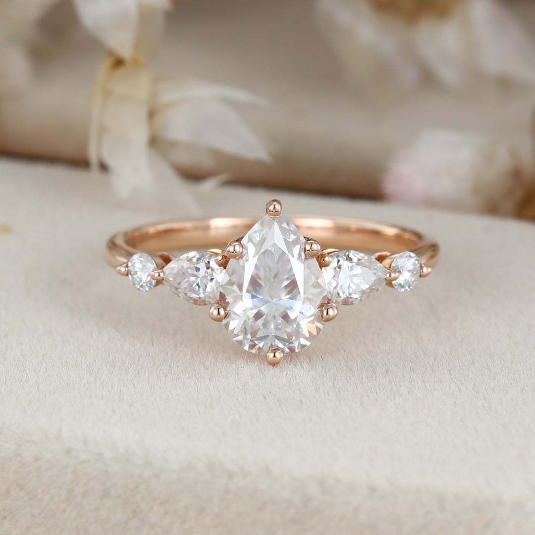1.5 Carat Pear Shaped Moissanite Ring In 14k Rose Gold