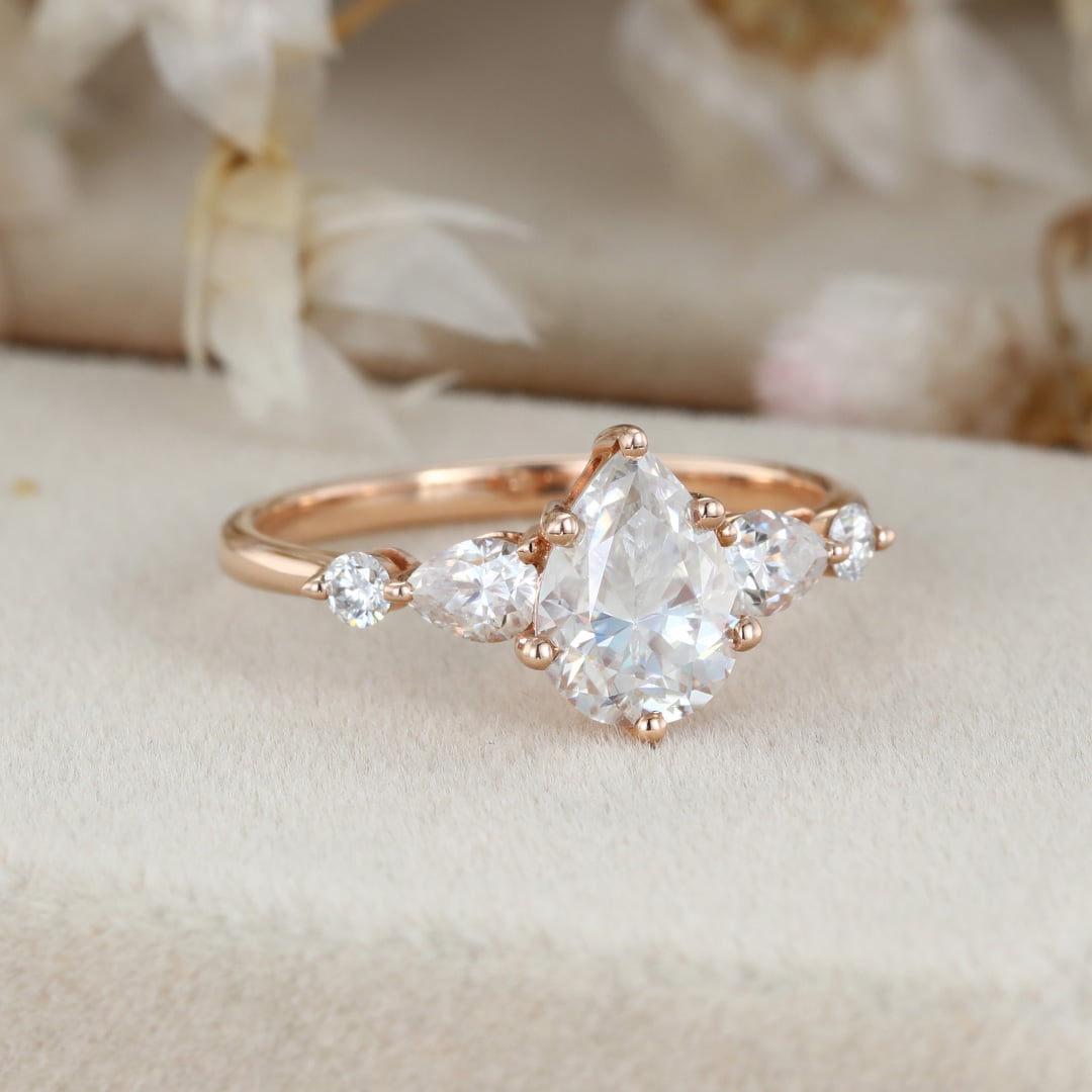 1.5 Carat Pear Shaped Moissanite Ring In 14k Rose Gold