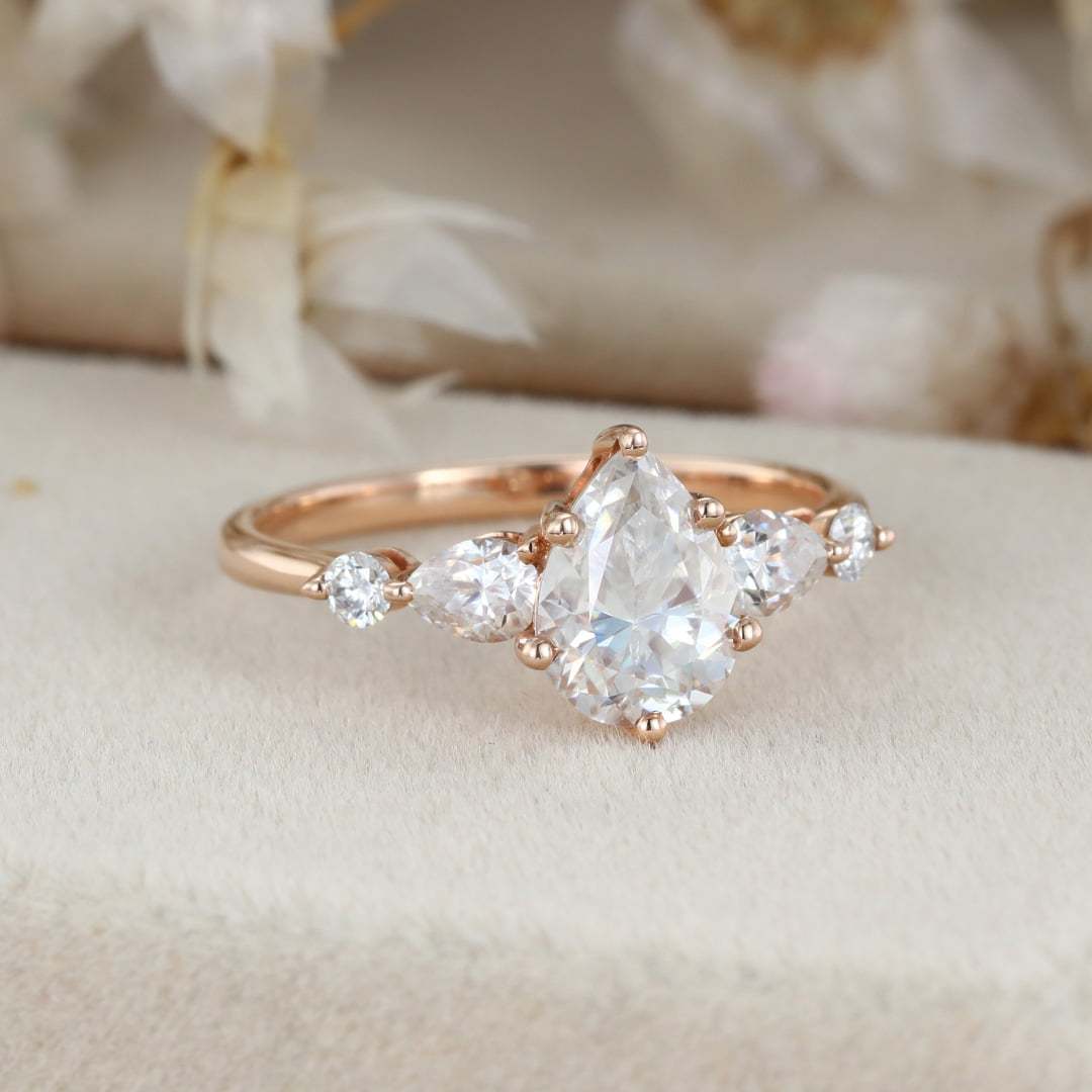 1.5 Carat Pear Shaped Moissanite Ring In 14k Rose Gold