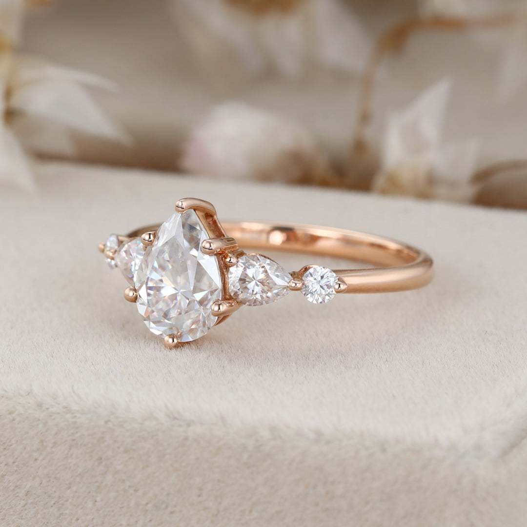 1.5 Carat Pear Shaped Moissanite Ring In 14k Rose Gold