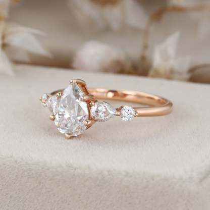 1.5 Carat Pear Shaped Moissanite Ring In 14k Rose Gold
