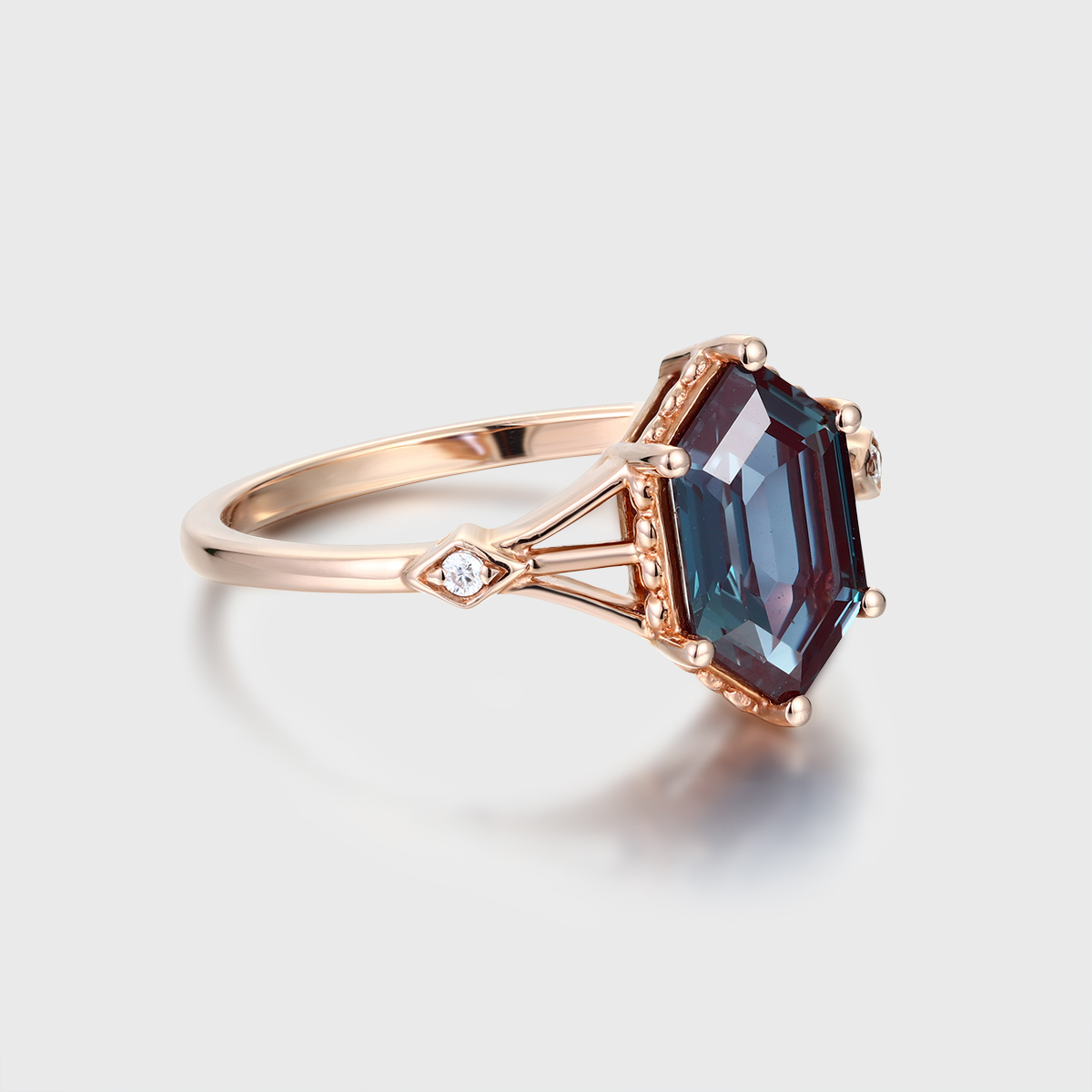 Unique Long Hexagon Cut Three-Stone Alexandrite Engagement Ring in Rose Gold
