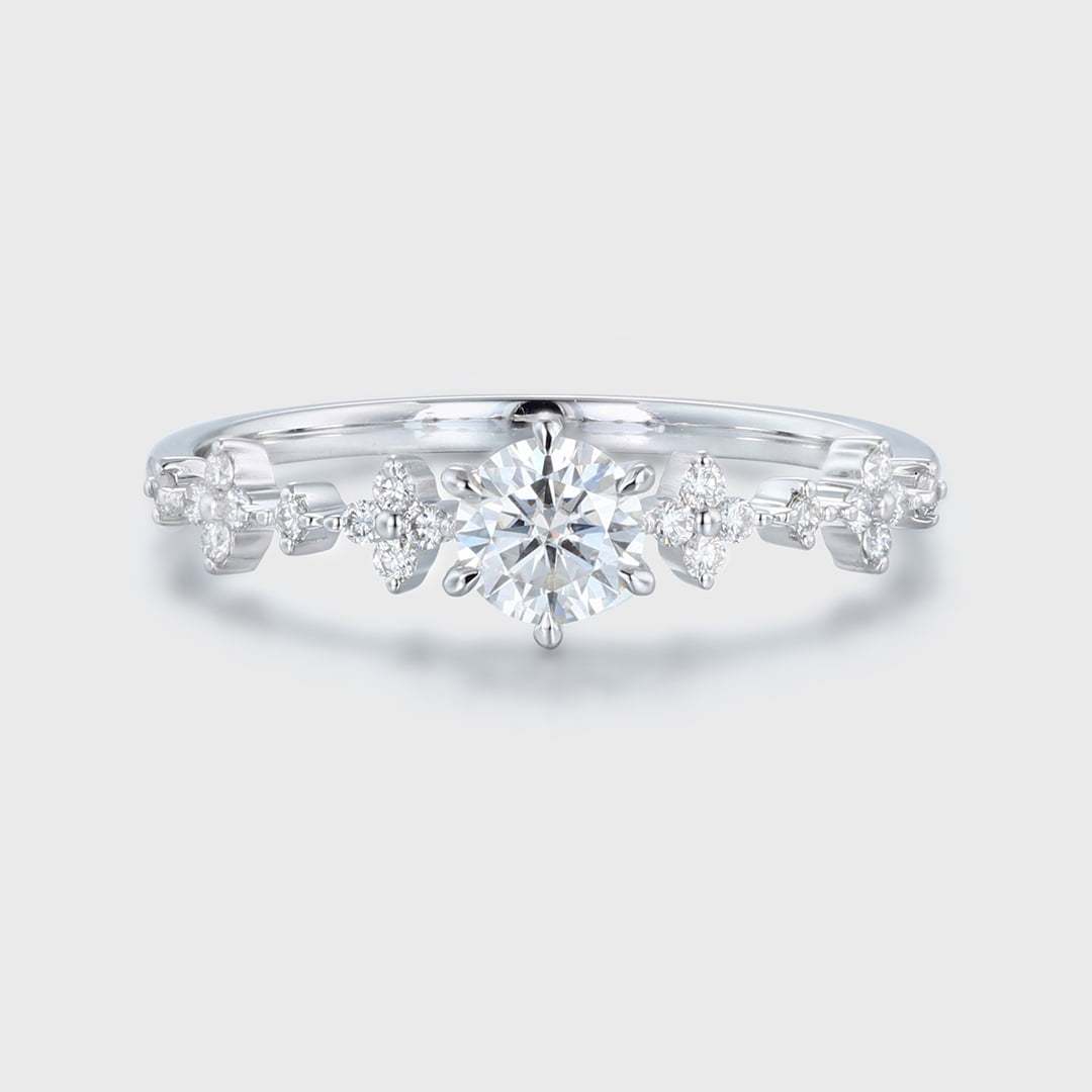 Love Blossoms: 0.5 ct Round Cut Moissanite Anniversary Ring. Embrace the Beauty of a Unique White Gold Flower Ring.