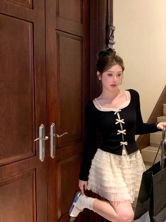 Ruffled Ribbed-Knit Top