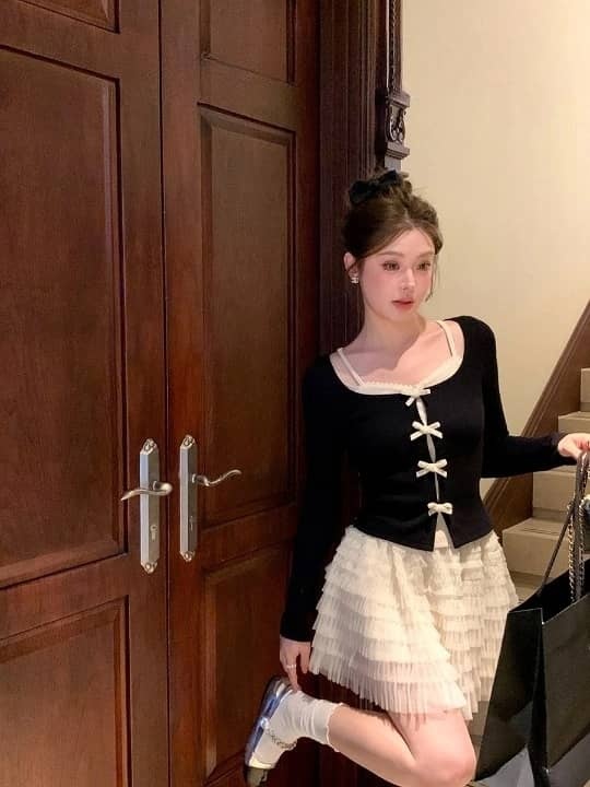 Ruffled Ribbed-Knit Top