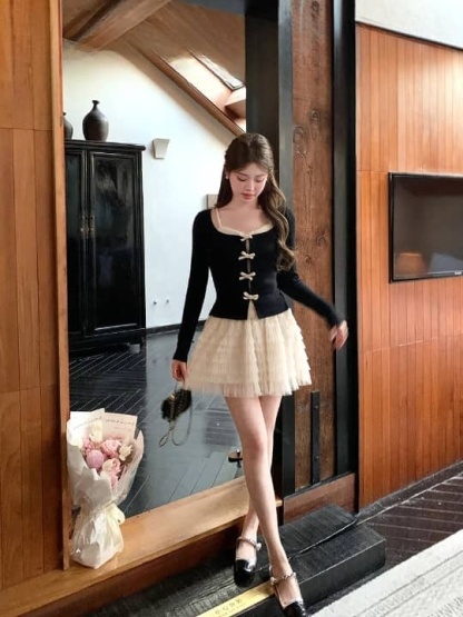 Ruffled Ribbed-Knit Top