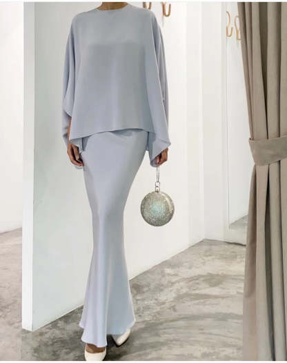 Fashionable solid color irregular top and skirt suit