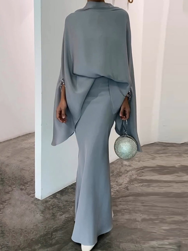 Fashionable solid color irregular top and skirt suit