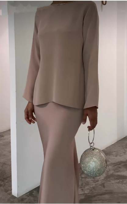 Fashionable solid color irregular top and skirt suit