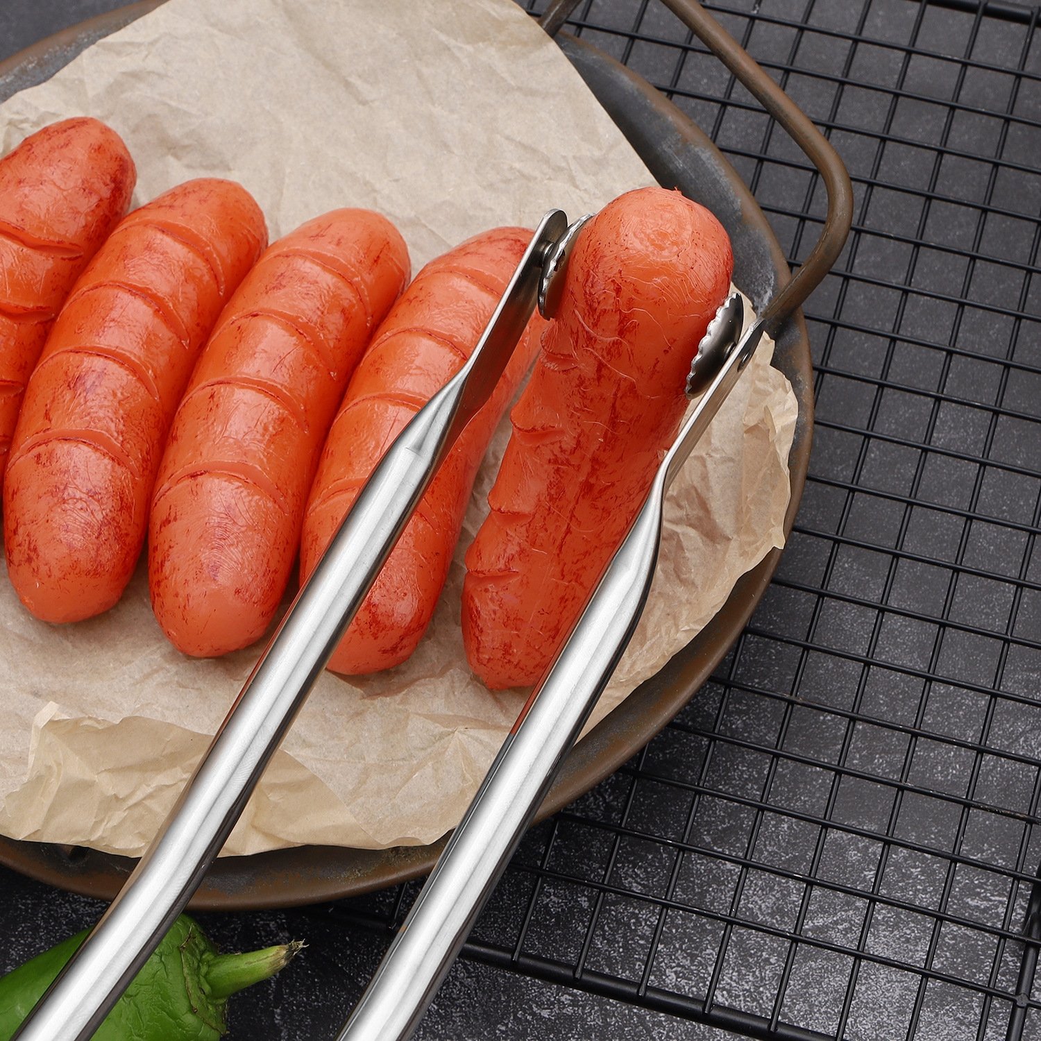 🔥Last Day Sale - 60%Off🔥Magic Rotatable BBQ Sausage Turning Tongs