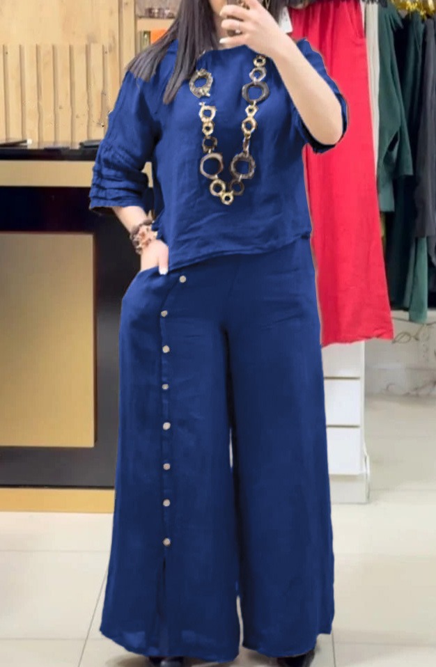 Fashion solid color loose casual three-quarter sleeve top loose pants suit