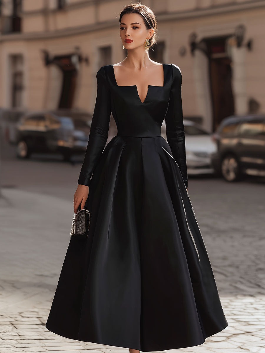Fitted Bodice Black Gown With Volume 