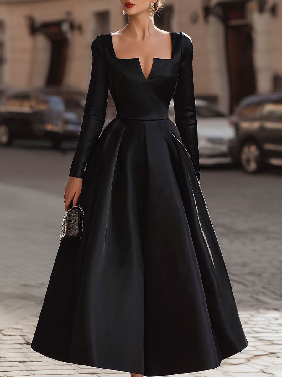 Fitted Bodice Black Gown With Volume 