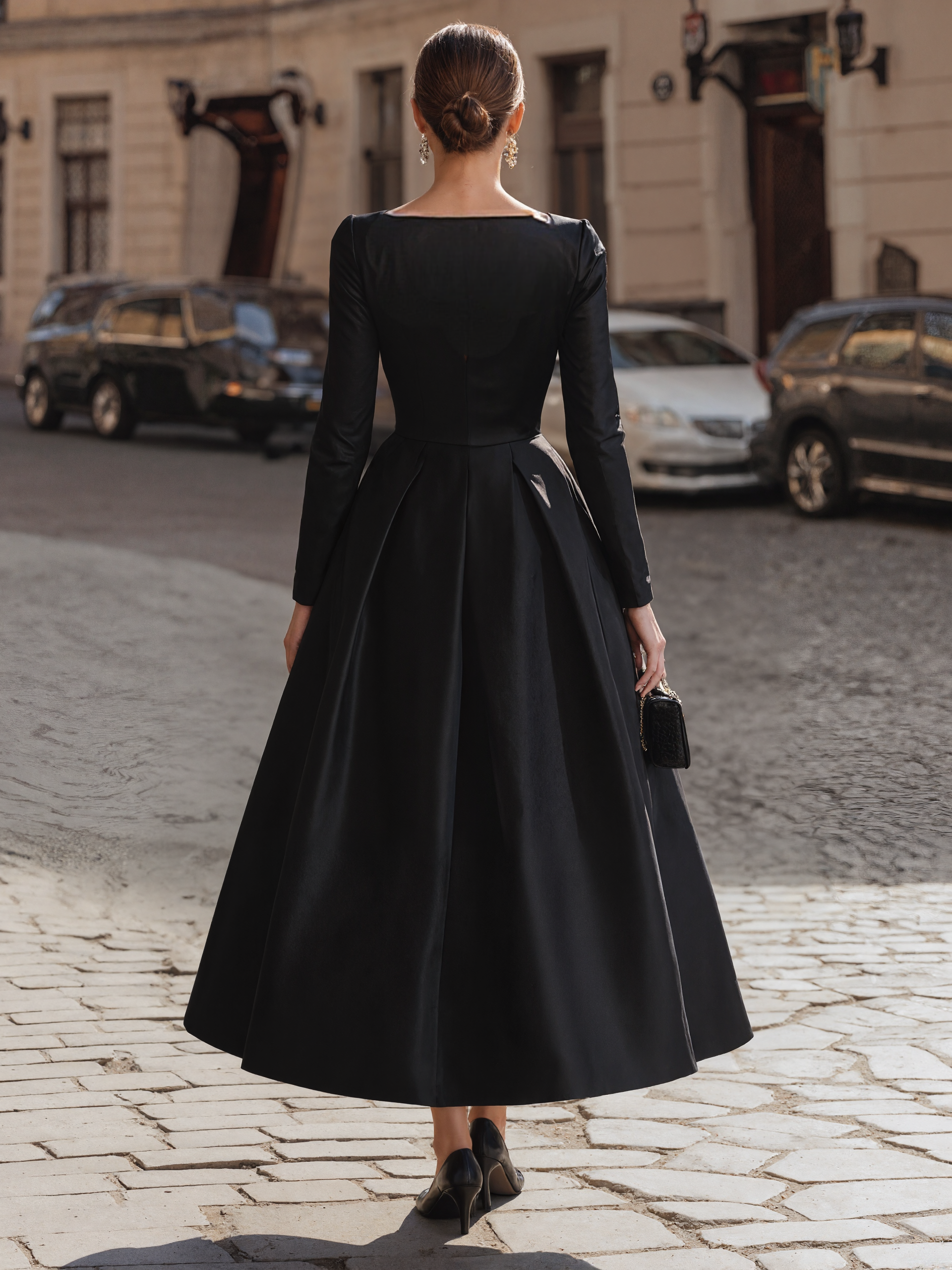 Fitted Bodice Black Gown With Volume 